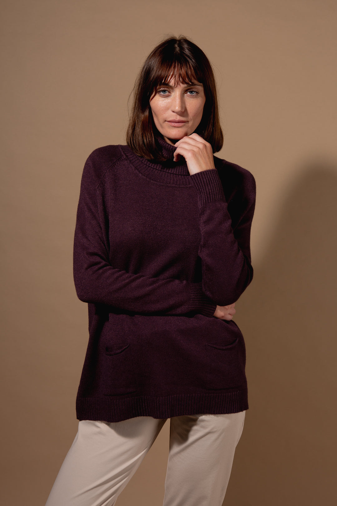 Two Pocket Roll Neck Jumper