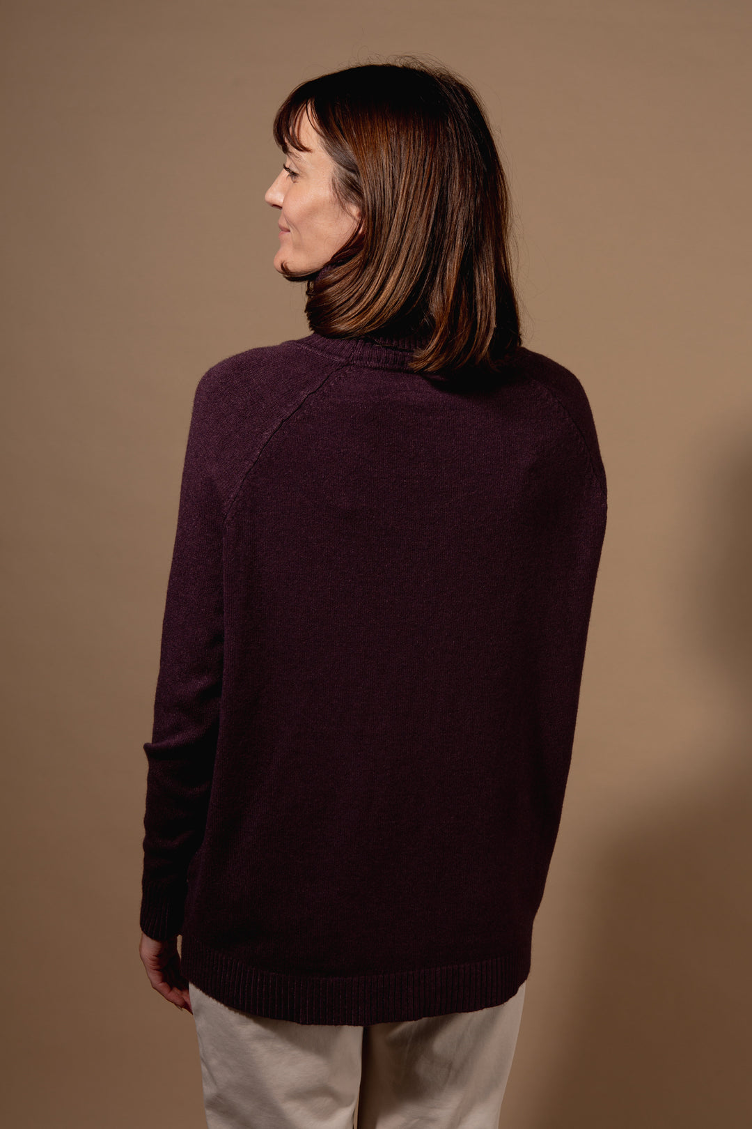 Two Pocket Roll Neck Jumper