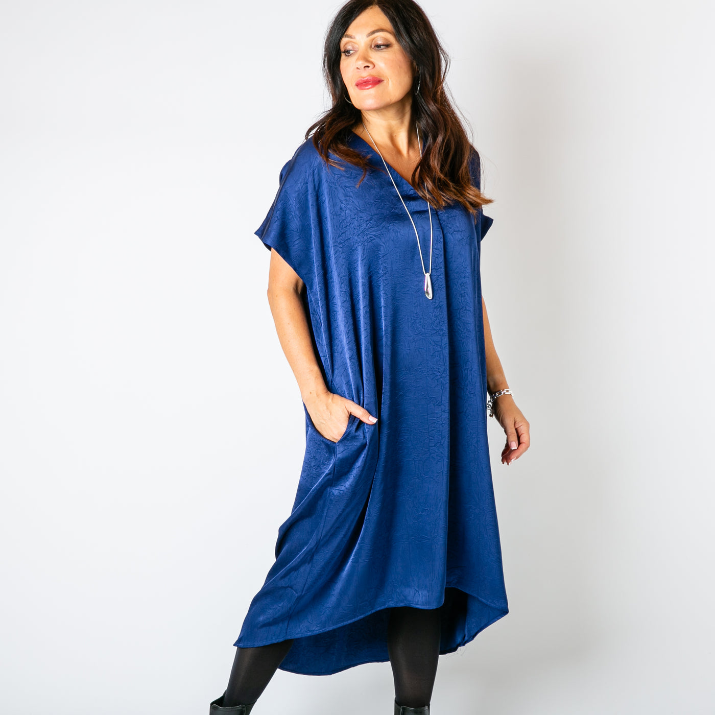 The navy blue Satin Kaftan Dress with short sleeves and a v neckline 