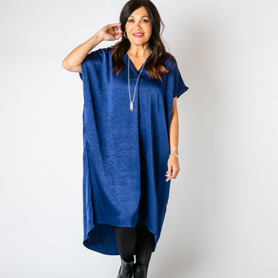 The navy blue Satin Kaftan Dress with pockets on either side of the waist