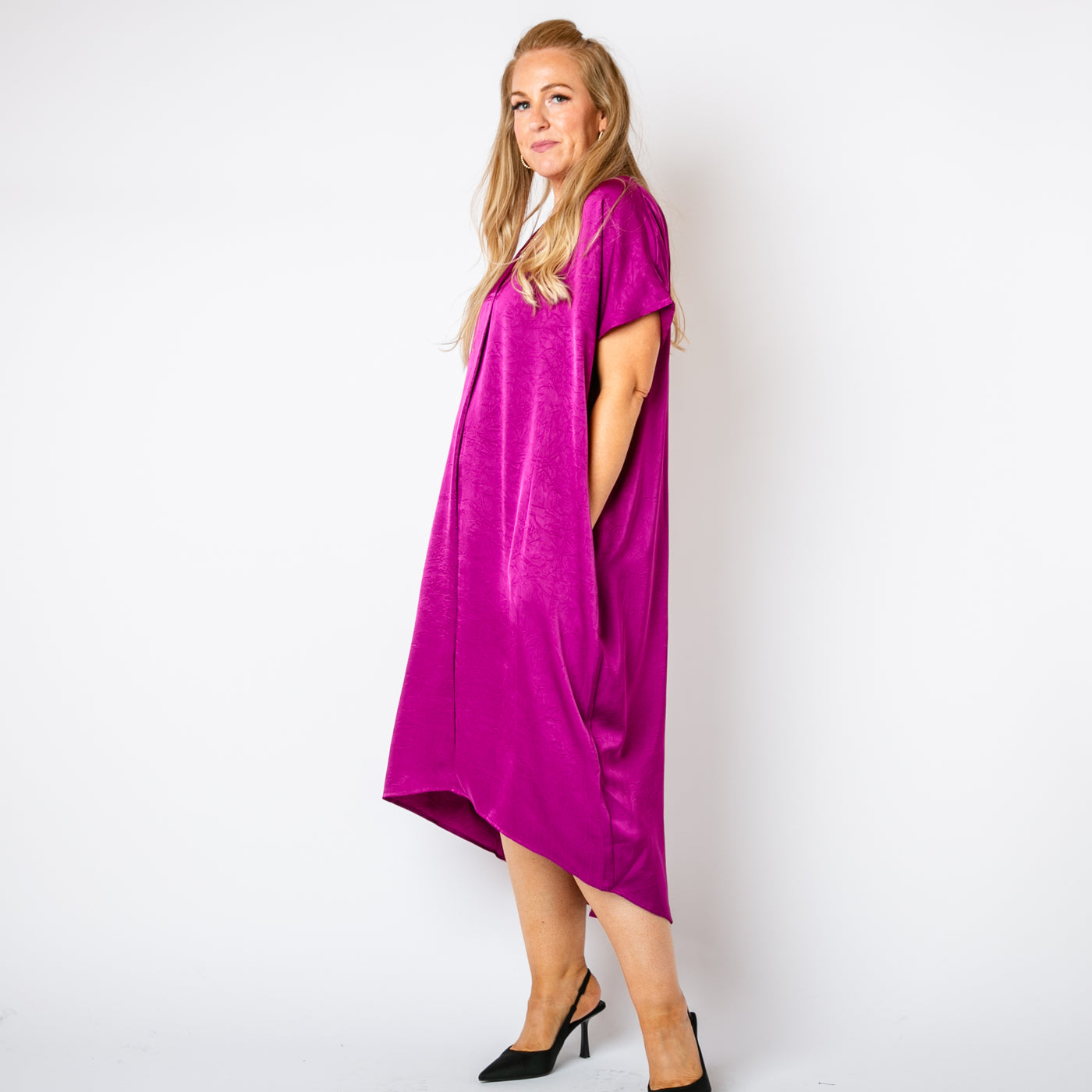 The plum purple Satin Kaftan Dress in a maxi length with a high-low hemline