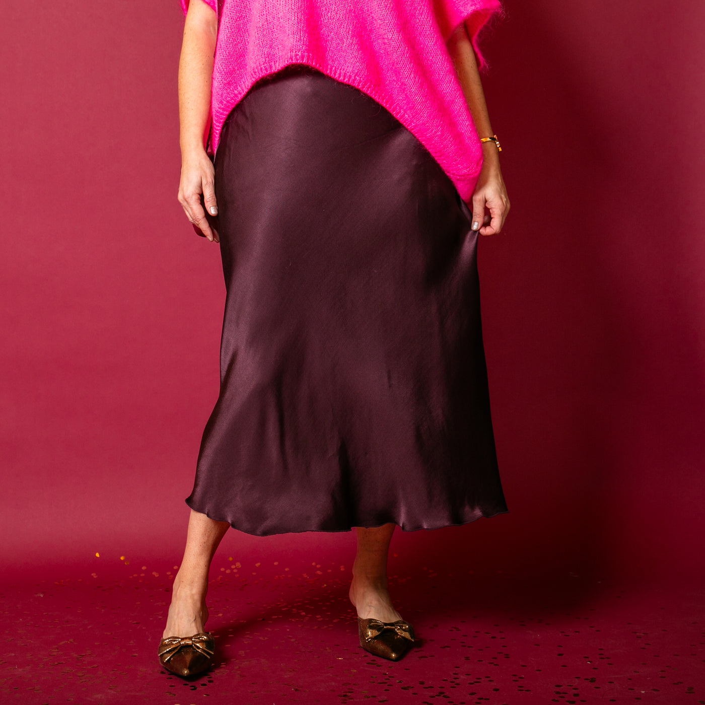 The plum purple Satin Slip Skirt with an elasticated waistband for added comfort