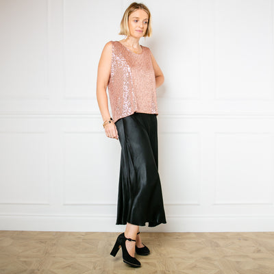 The Satin Slip Skirt in black perfect for an evening look or wear it casually with a jumper