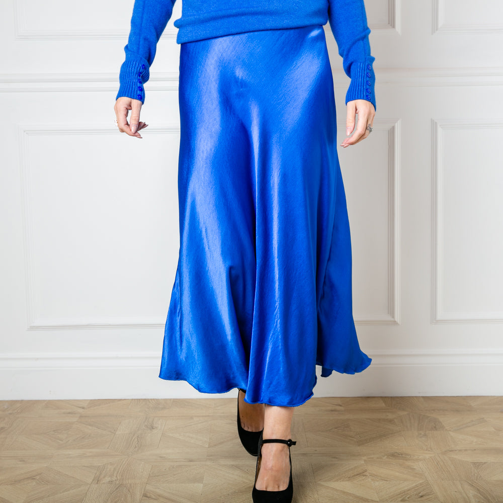 The Satin Slip Skirt in royal blue perfect for an evening look or wear it casually with a jumper