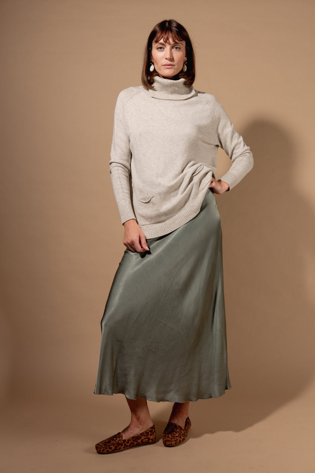 Two Pocket Roll Neck Jumper