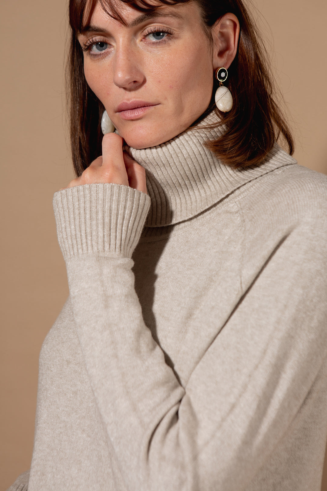 Two Pocket Roll Neck Jumper