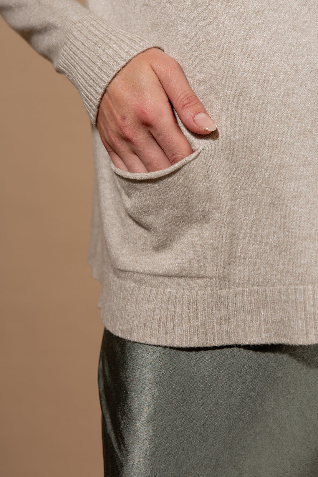 Two Pocket Roll Neck Jumper