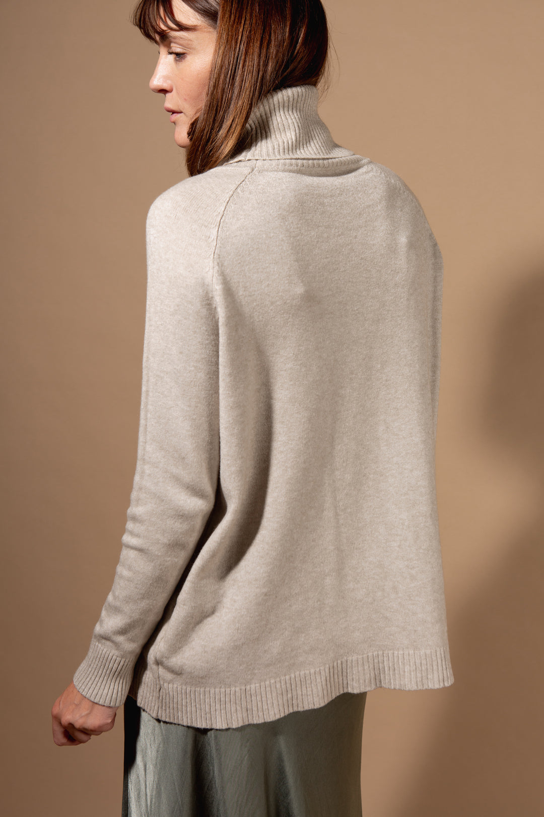 Two Pocket Roll Neck Jumper