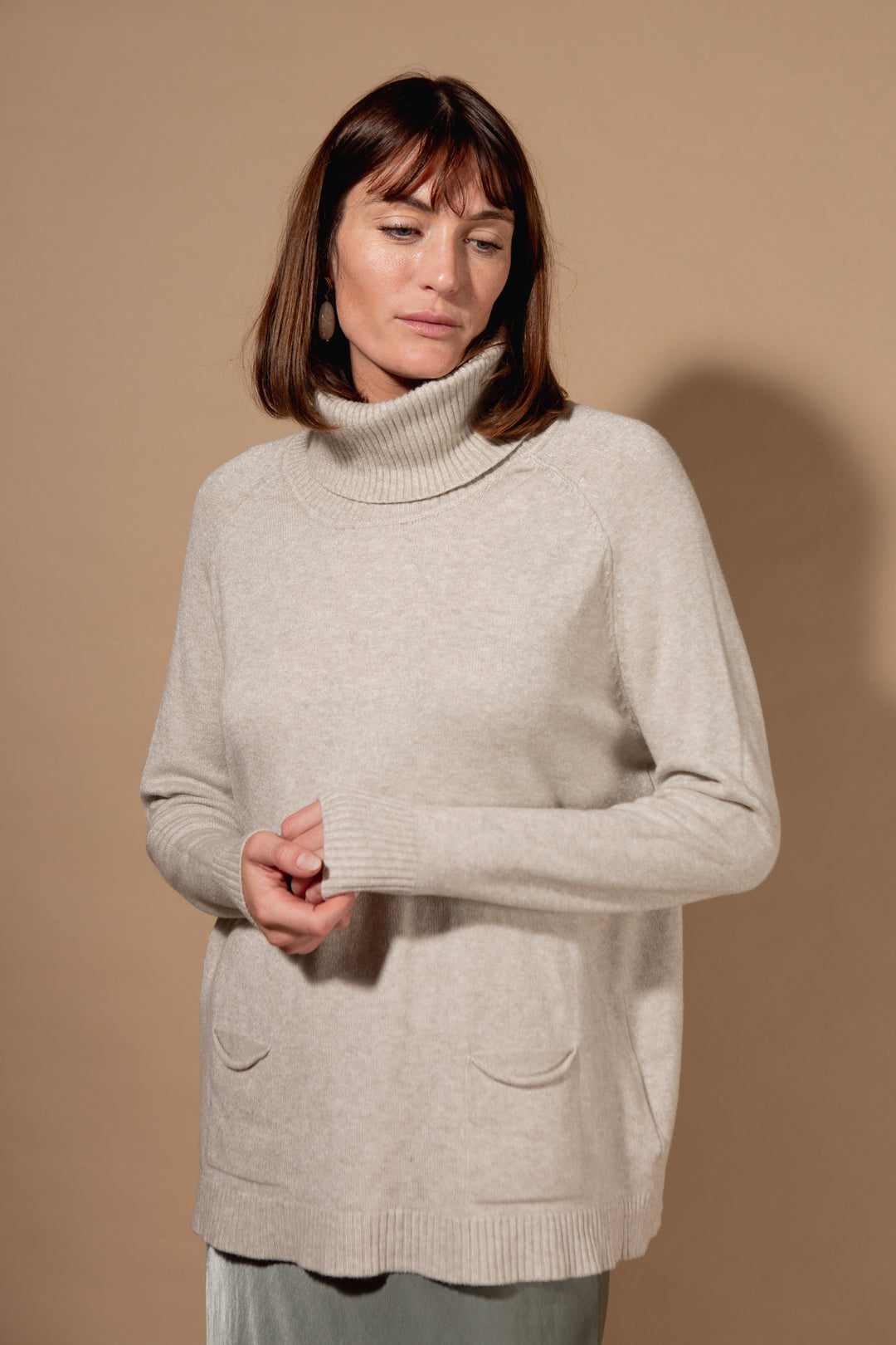 Two Pocket Roll Neck Jumper