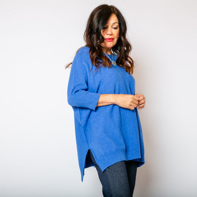 The cornflower blue Seam Front Jumper with a wide round neckline