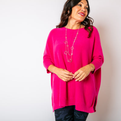 The fuchsia pink Seam Front Jumper made from a super soft, stretchy material