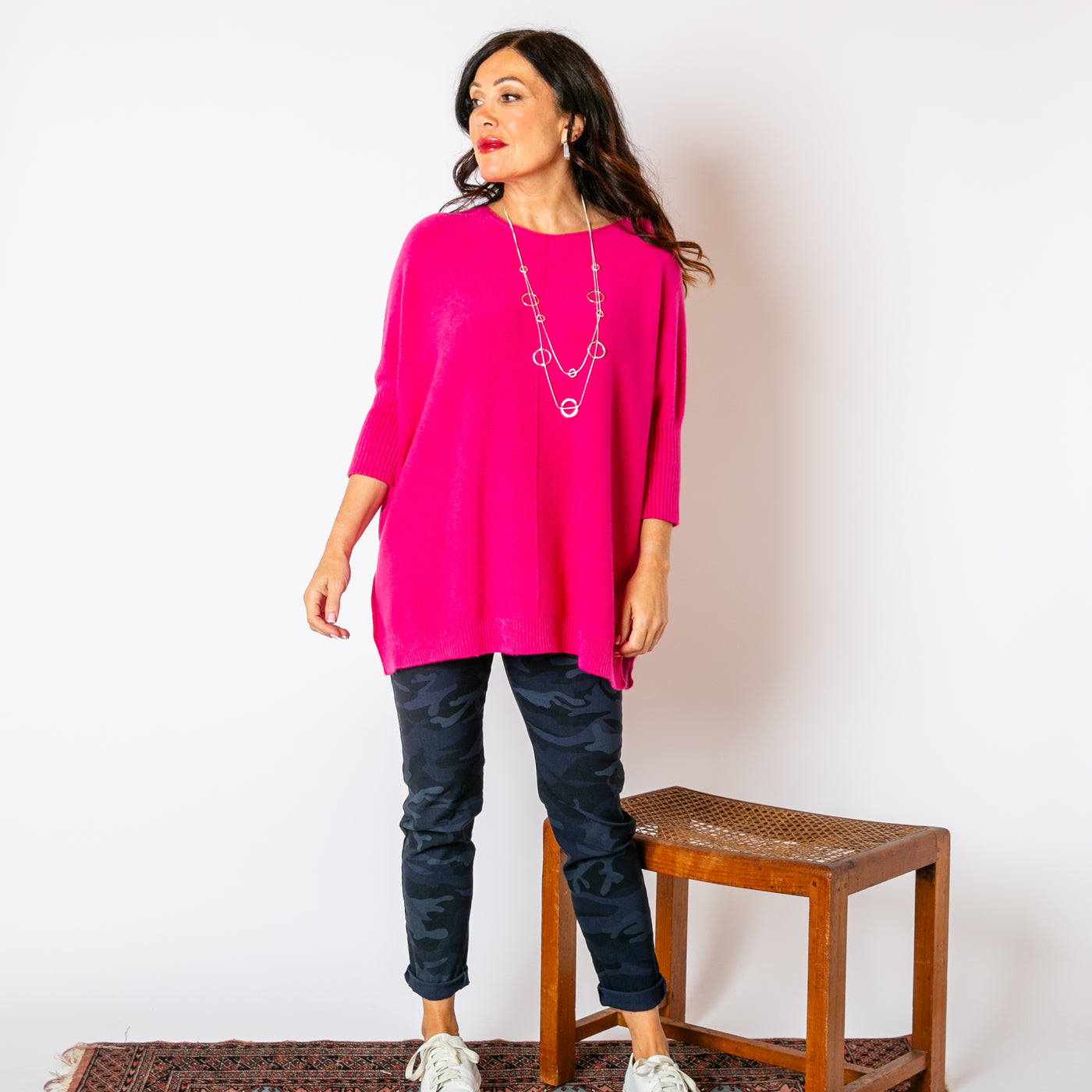 The fuchsia pink Seam Front Jumper with a wide round neckline