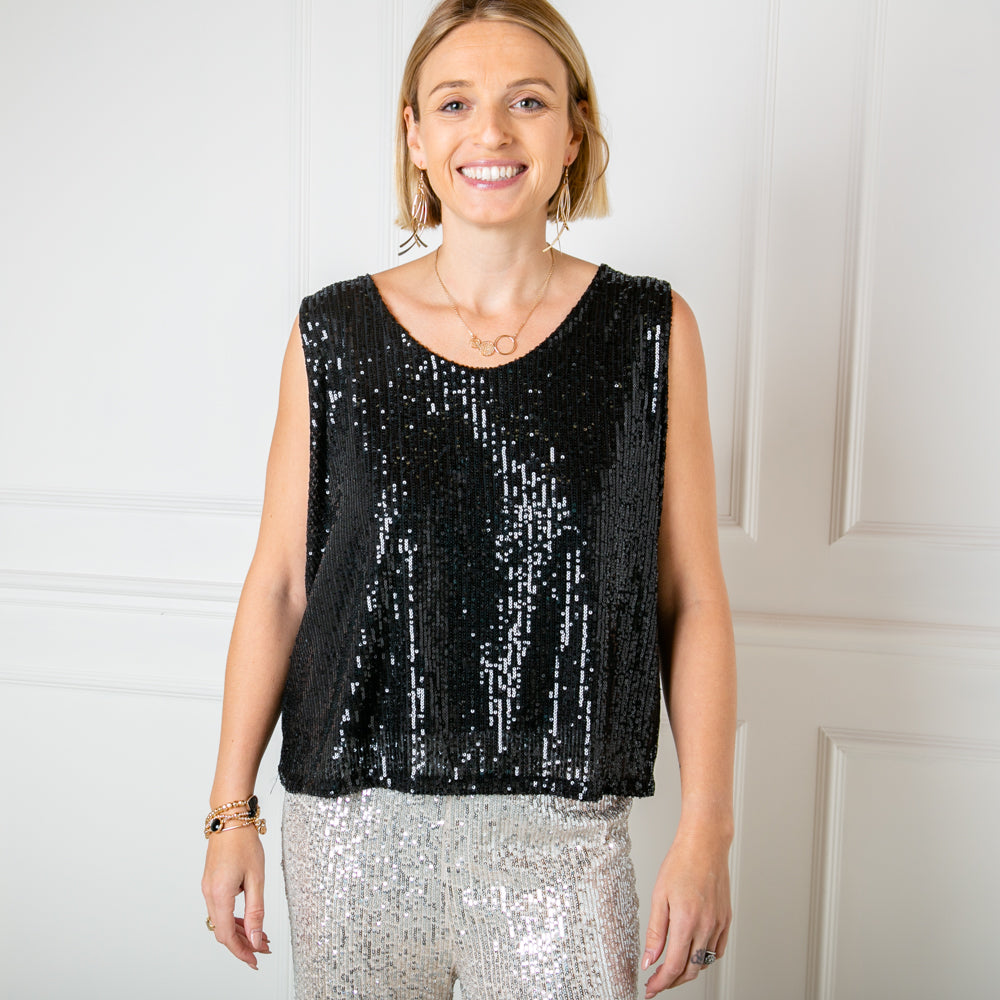 The Sequin Vest Top in black, sleeveless with a round neckline 