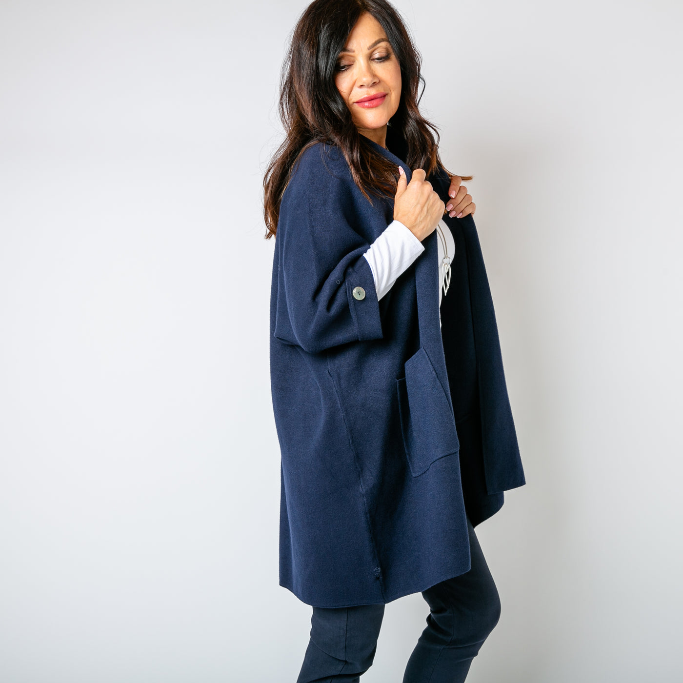 The navy blue Shawl Button Cardigan with 3/4 length sleeves featuring a button detail 