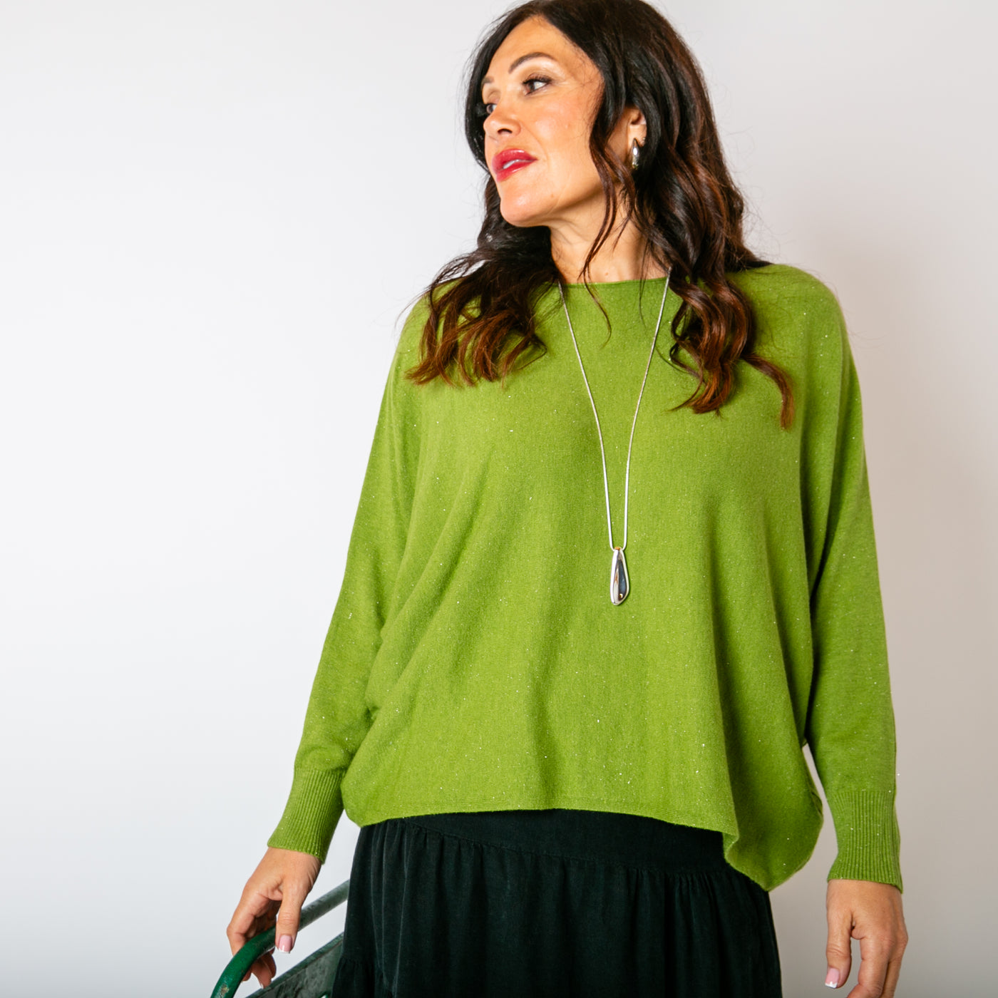 The green Shimmer Batwing Jumper with a relaxed batwing sleeve