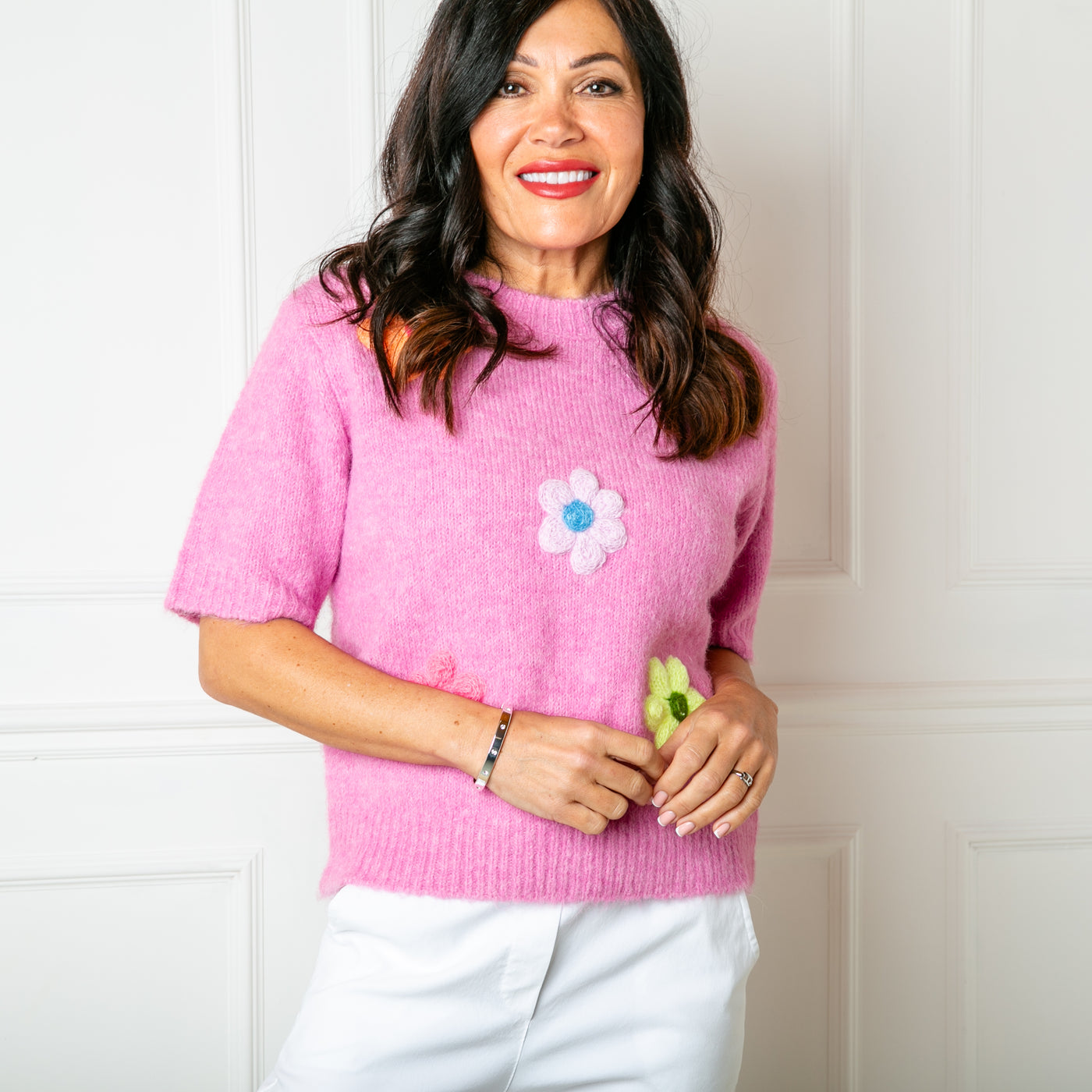 The baby pink Short Sleeve Daisy Jumper made from a blend of cotton and acrylic and perfect for spring