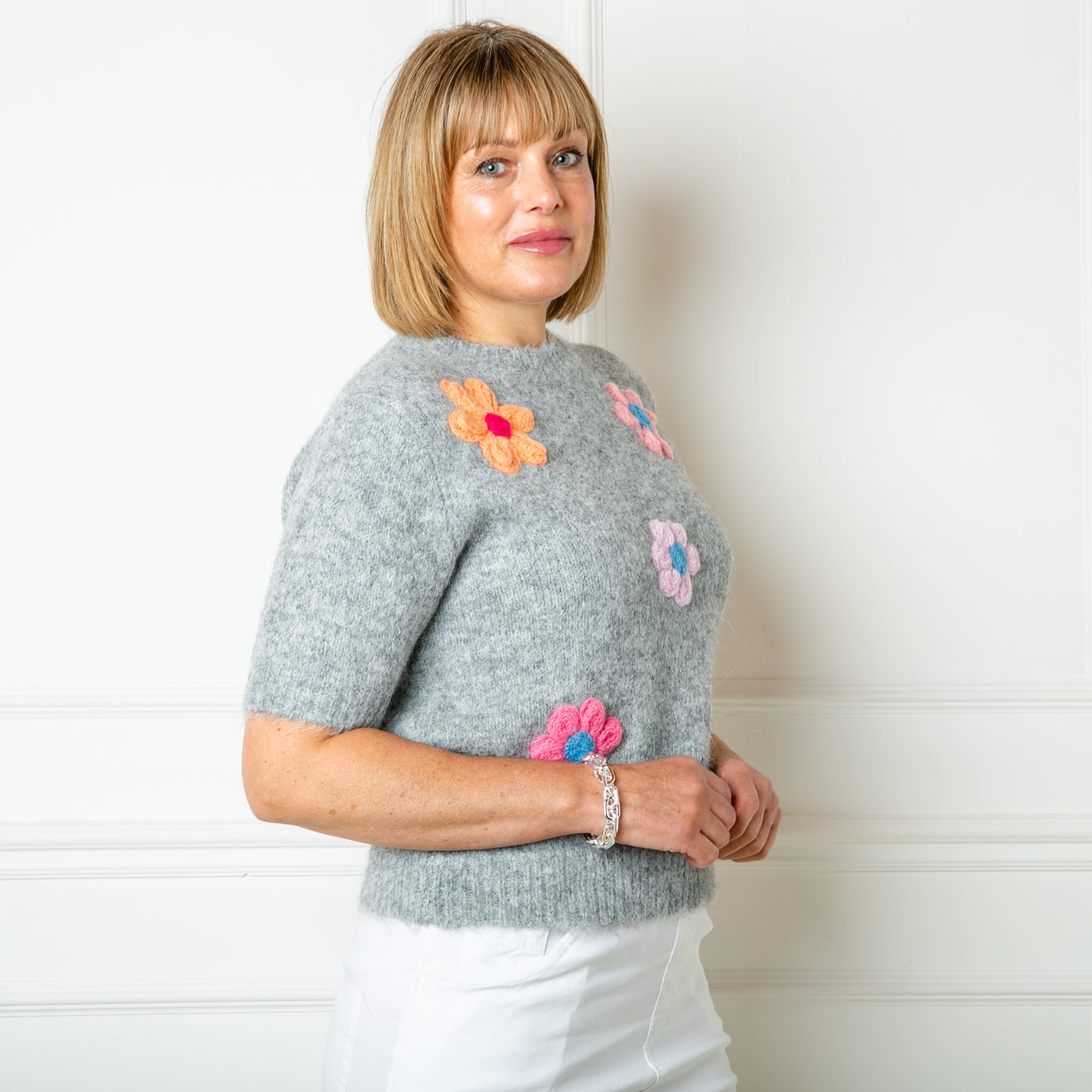 The grey Short Sleeve Daisy Jumper made from a blend of cotton and acrylic and perfect for spring