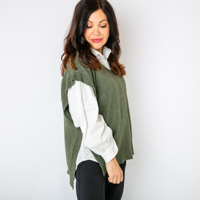 The khaki green Side Button Knitted Vest, open on either side with a button to fasten