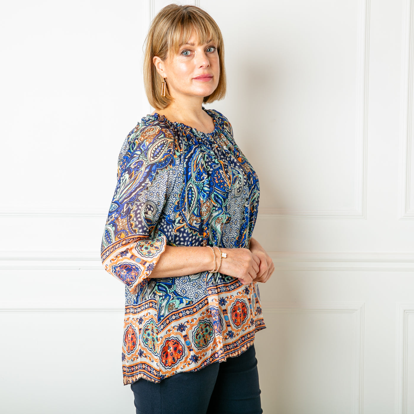 The navy blue Silk Blend Paisley Top in a beautiful, intrciate paisley print with a stretchy lining underneath