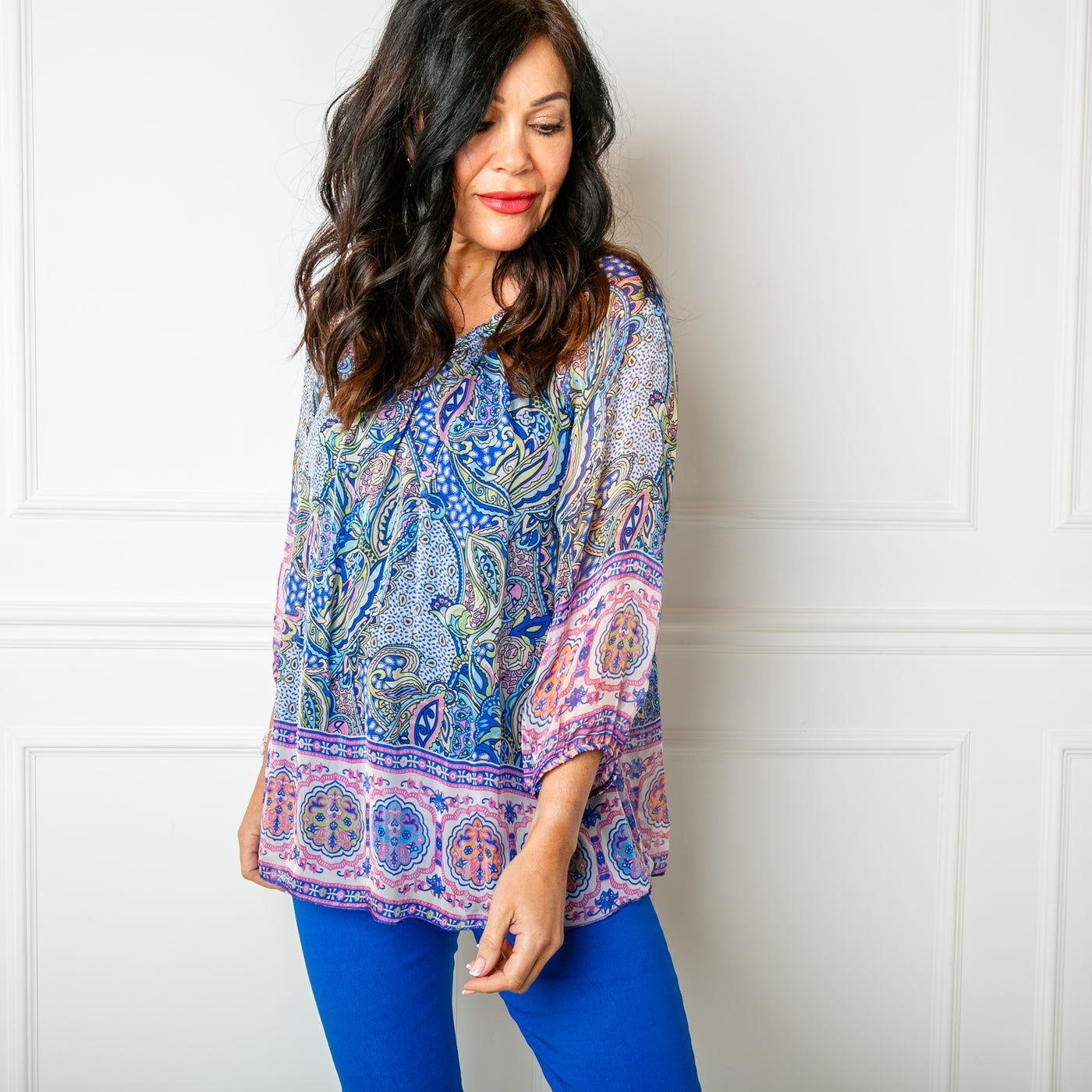 The royal blue Silk Blend Paisley Top in a beautiful, intrciate paisley print with a stretchy lining underneath