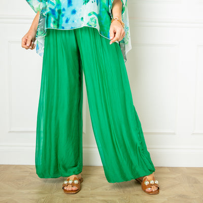 The emerald green Silk Blend Trousers, made from a beautiful silk material with a stretchy jersey lining underneath