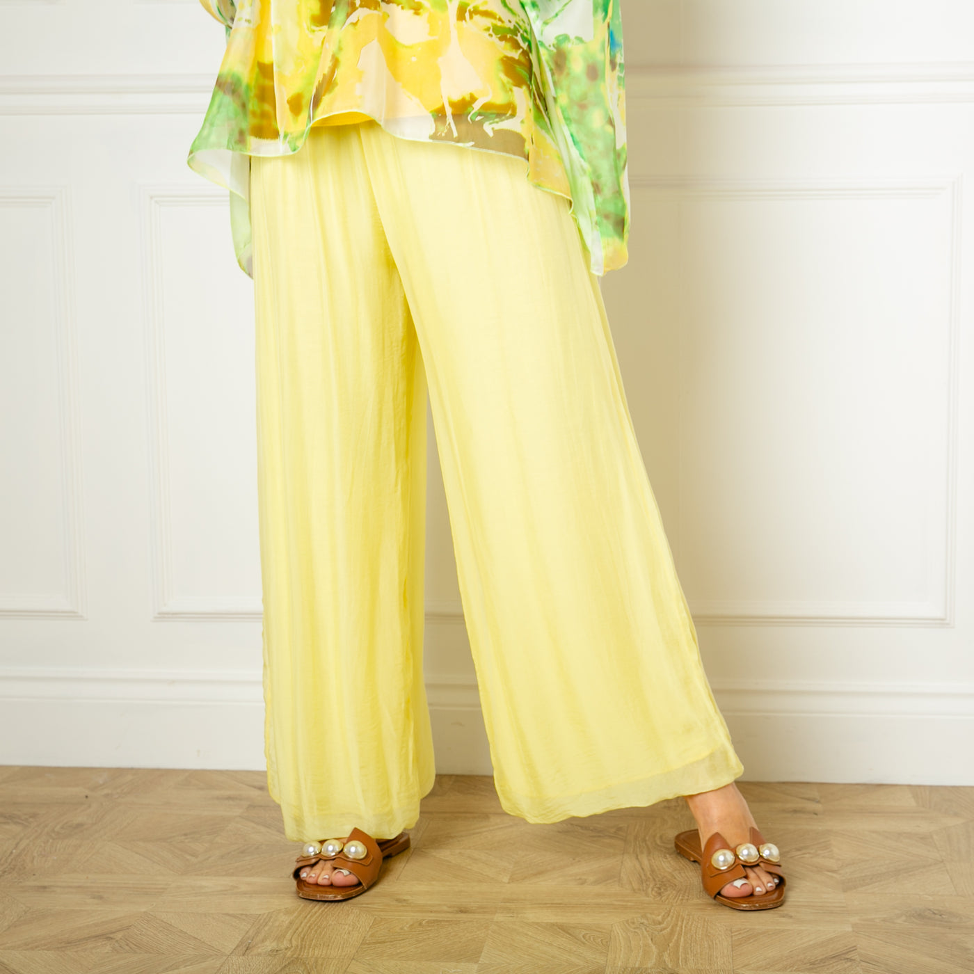 The yellow Silk Blend Trousers, made from a beautiful silk material with a stretchy jersey lining underneath