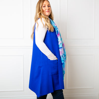 The Sleeveless Cardigan in royal blue with an open  waterfall effect front