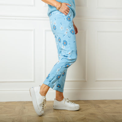 The baby blue Slim Fit Floral Trousers made from a super stretchy blend of viscose nylon and spandex