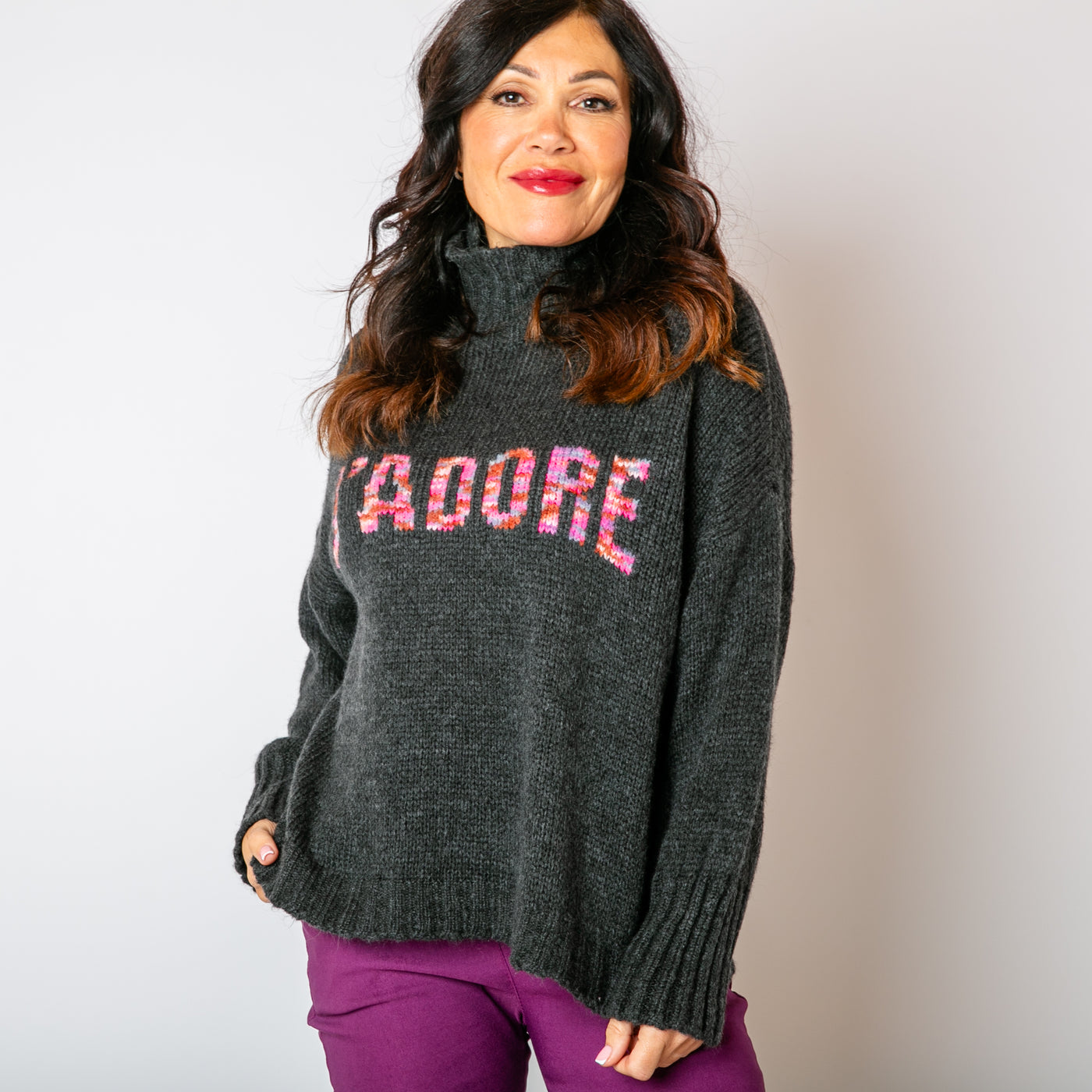 The charcoal grey Slogan Wool Blend Jumper with pink writing across the front