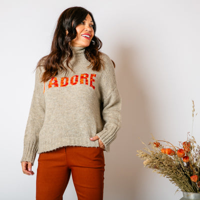 The taupe brown Slogan Wool Blend Jumper with orange writing across the front