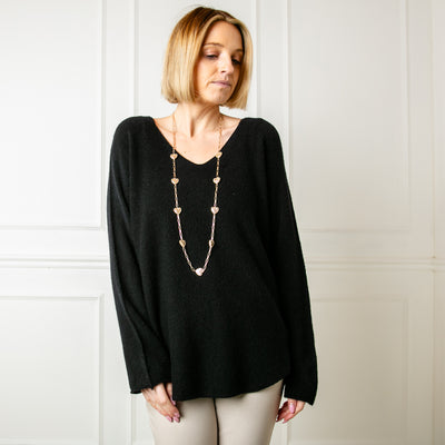 The black Soft V Neck Jumper with long sleeves and statement seam detailing from the shoulder down