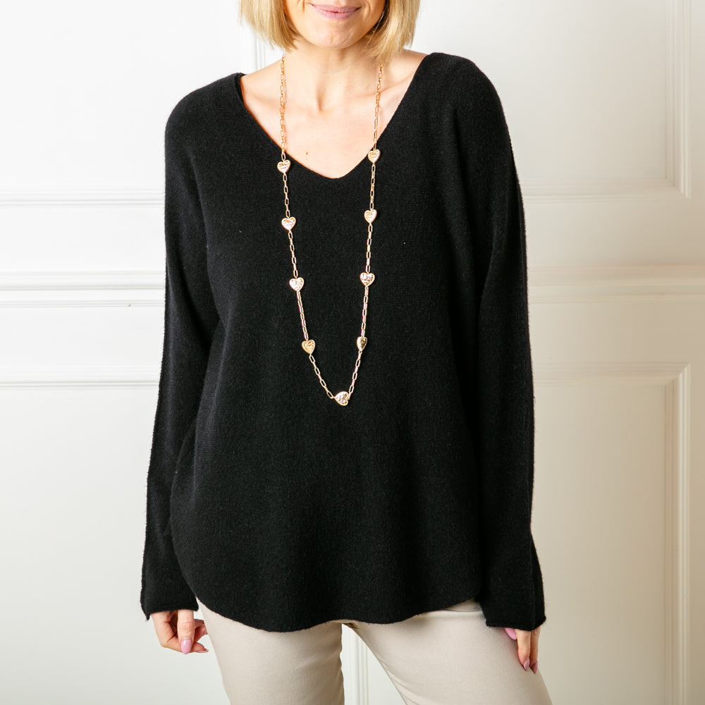 The black Soft V Neck Jumper makes the perfect wardrobe staple for spring and summer this year