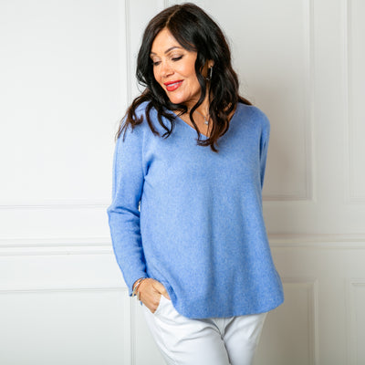 The cornflower blue Soft V Neck Jumper with long sleeves and statement seam detailing from the shoulder down