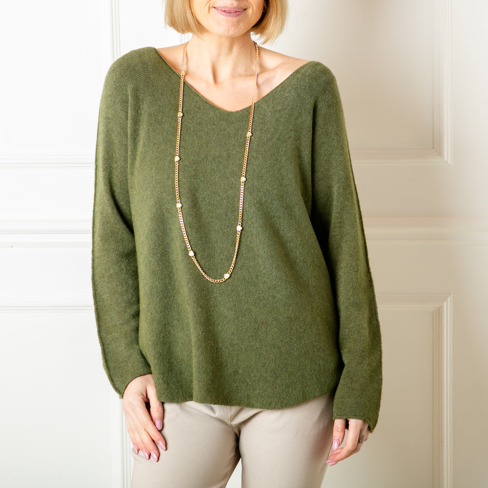 The khaki green Soft V Neck Jumper with long sleeves and statement seam detailing from the shoulder down