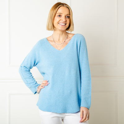The sky blue Soft V Neck Jumper with long sleeves and statement seam detailing from the shoulder down