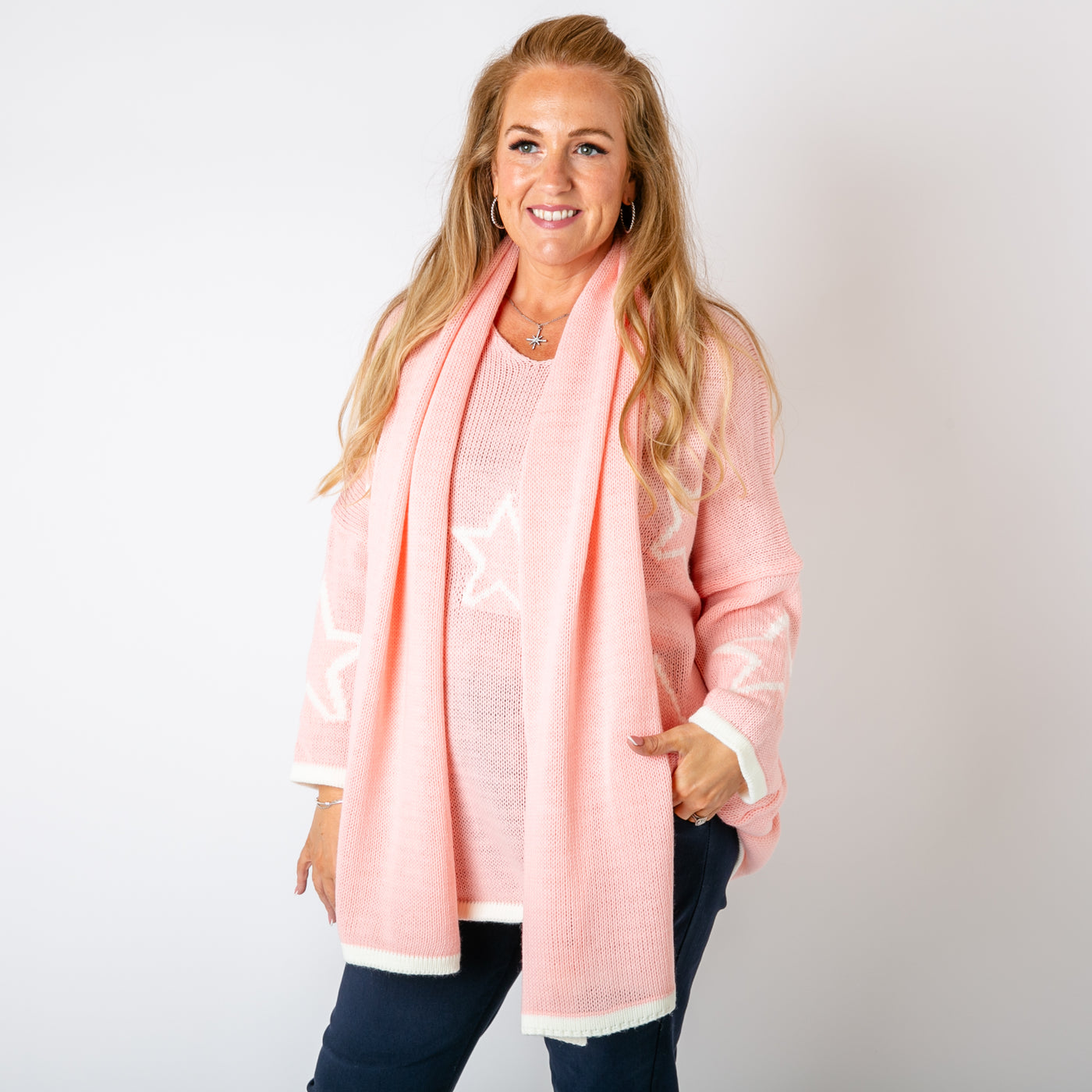 The baby pink Star Jumper & Scarf with a large star print across the front of the jumper