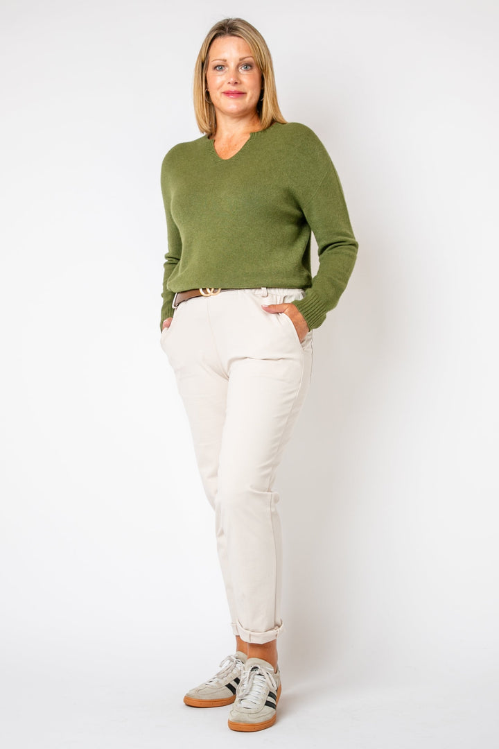 The cream Stretch Chinos with pockets on either side of the hip and on the back