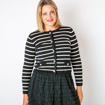 The black Stripy Pearl Cardigan long sleeves and pockets on either side of the waist