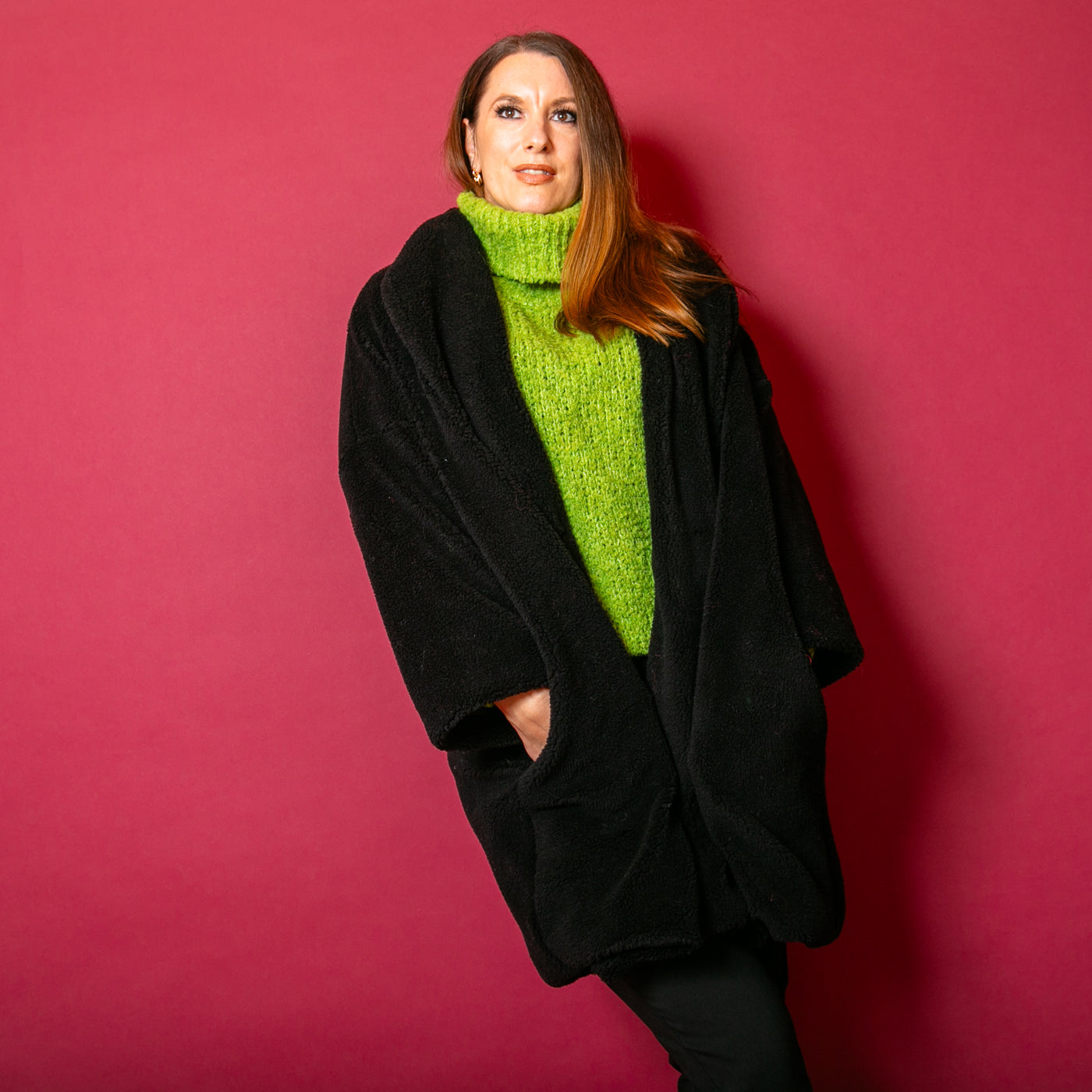 The black Teddy Bear Coat which looks great with on of our chunky knitted scarves