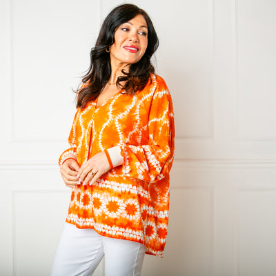 The orange Tie Dye Jersey Cuff Top in a gorgeous vibrant dyed pattern perfect for summer