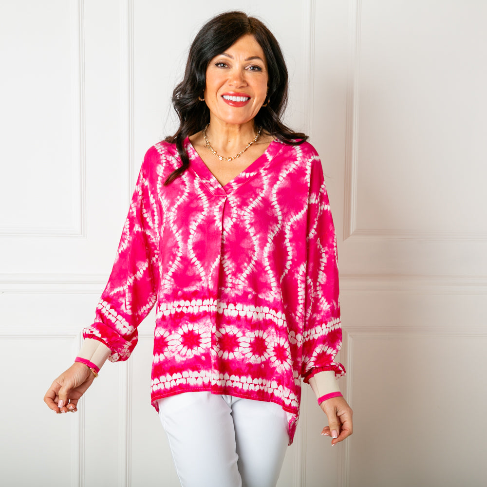 The fuchsia pink Tie Dye Jersey Cuff Top with long sleeves that have a stretchy contrasting cuff