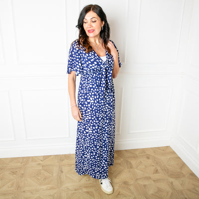 The navy blue Tie Front Picnic Dress in a maxi length with a slit on the side up to the knee