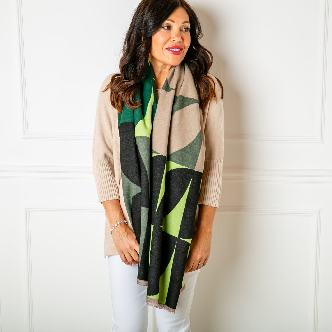 The green Toronto Scarf featuring a bold geometric print