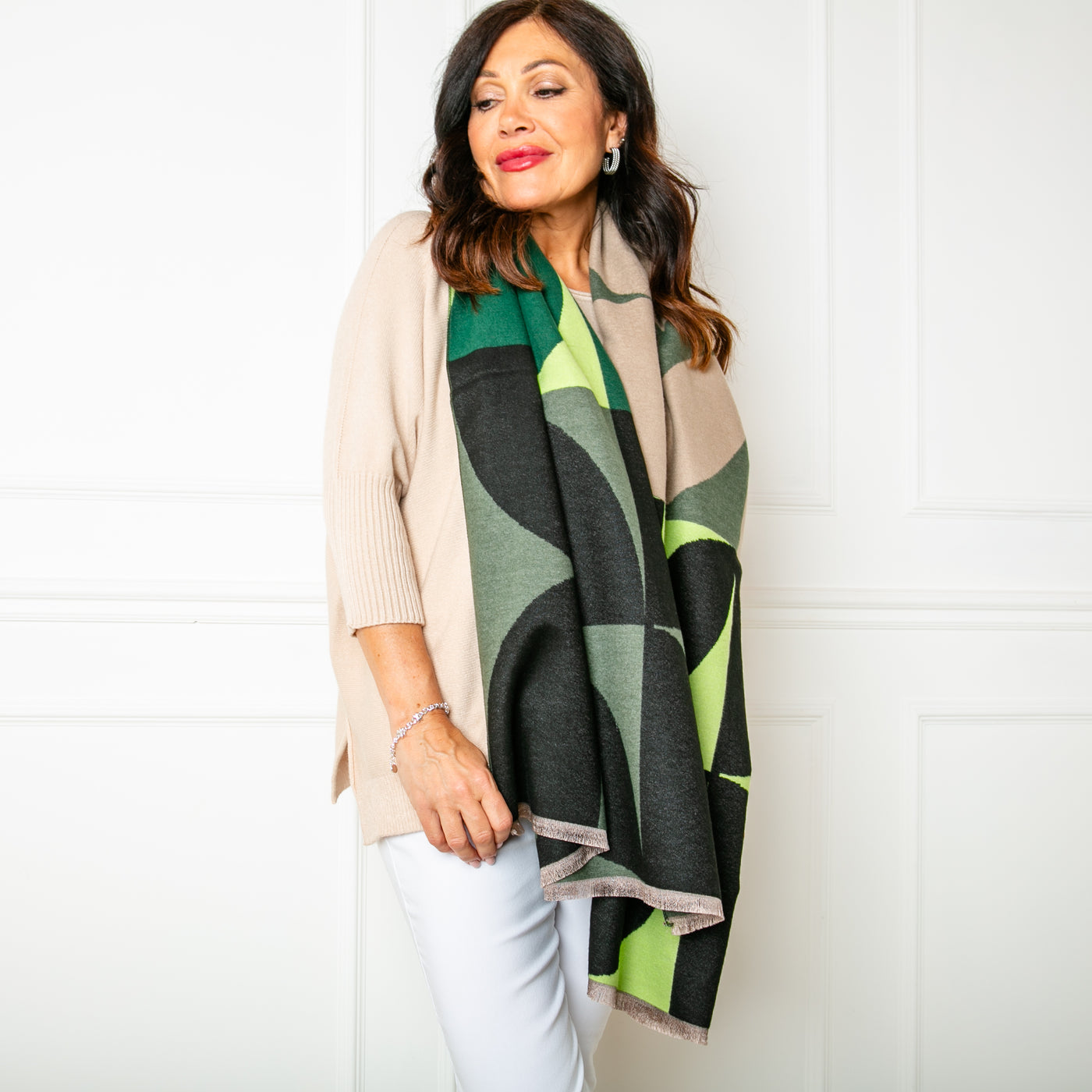 The green Toronto Scarf made from a blend of viscose and wool