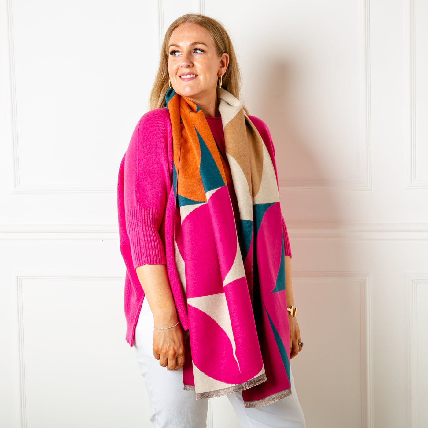 The pink Toronto Scarf featuring a bold geometric print