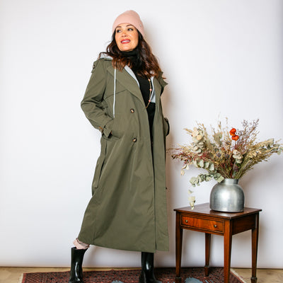 The khaki green Trench Coat With Hood with a longline silhouette and a contrasting grey hood