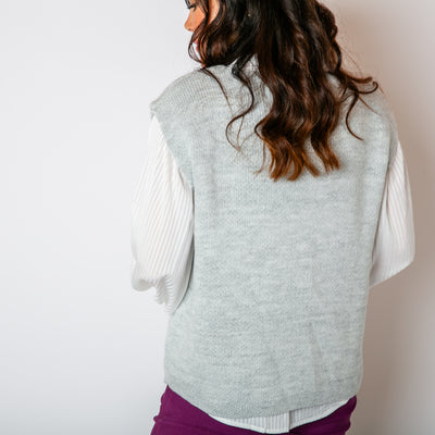 The Two Button Sleeveless Cardigan in silver grey made from 100% acrylic 