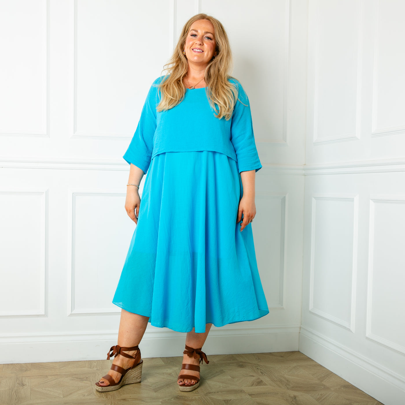 The Aqua Blue Two Piece Dress which can be worn with the top and dress together as a set or as separate pieces