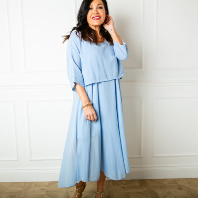 The dusky blue Two Piece Dress with a top that has 3/4 length sleeves and a round neckline