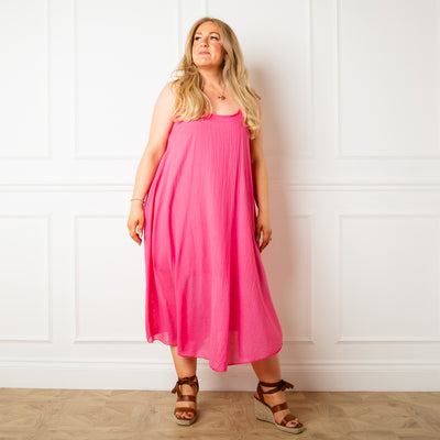 The pink Two Piece Dress with a top that has 3/4 length sleeves and a round neckline